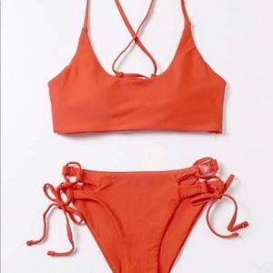 New without tags. Super cute orange swimsuit.